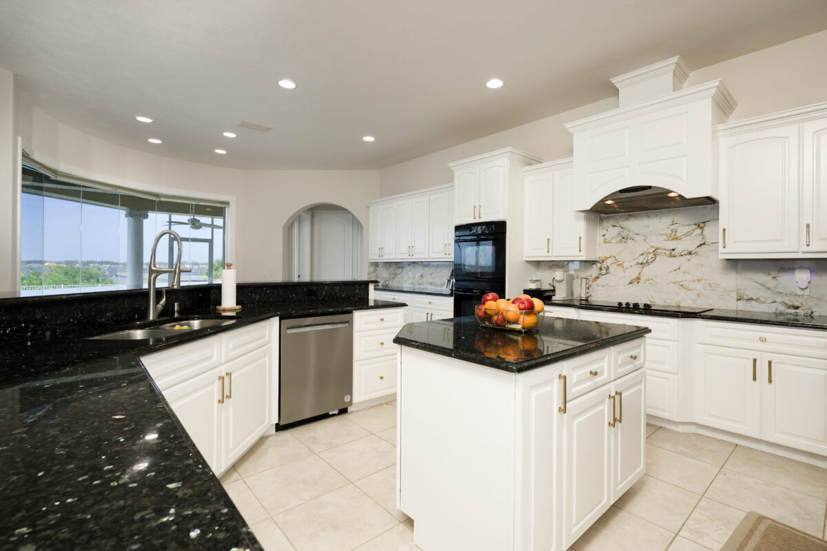 Modern Daytona Beach kitchen transformation with white shaker cabinets and quartz countertops